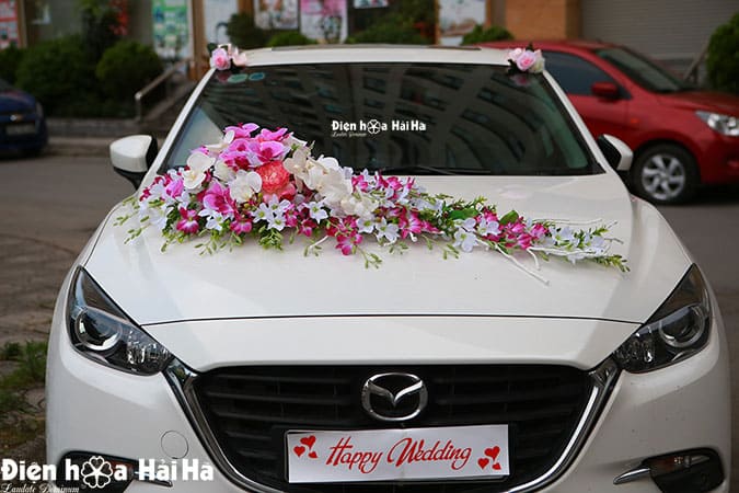 Hoa xe cưới bằng lụa gắn xe cô dâu lan Hồ Điệp đẹp
