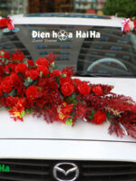 Hoa lụa kết xe cưới tông mầu đỏ