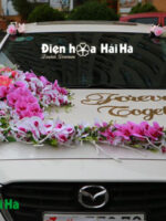 Bộ hoa giả gắn xe cưới lan hồ điệp hồng sang chảnh