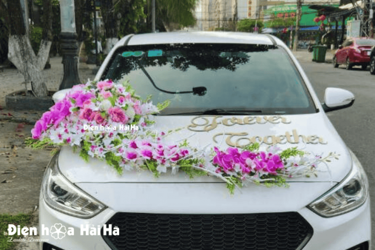 Hình thực tế bộ hoa giả gắn xe cưới lan hồ điệp hồng - tím
