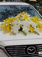 Bộ hoa giả trang trí xe cưới hoa lan vang va ho diep trang