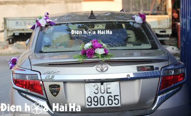 Chi tiết cabo sau mẫu hoa giả kết xe cưới màu tím - Tình Viên Mãn