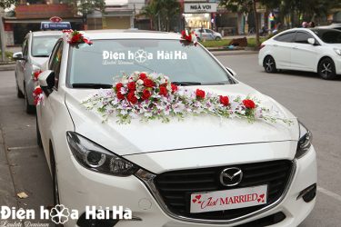 Tổng thể bộ hoa lụa kết xe cưới lan nhụy tím