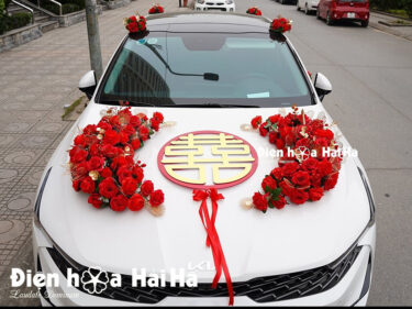 Hoa lụa xe cưới mầu đỏ hot 20234