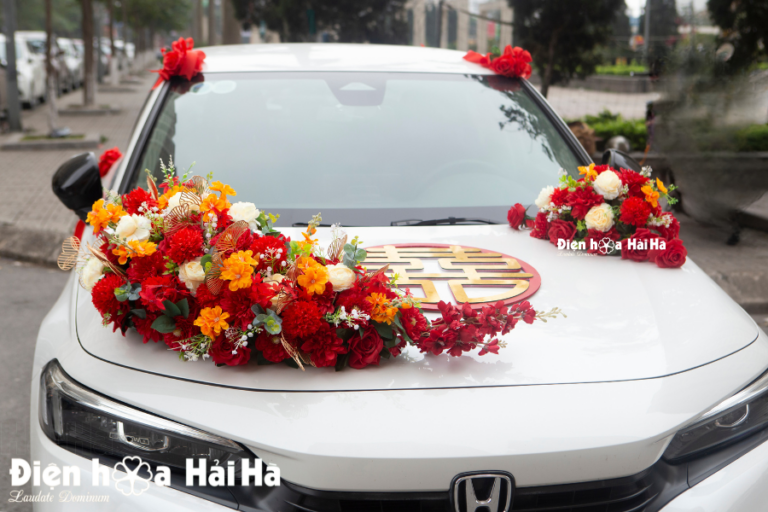 Bán bộ hoa lụa kết xe cưới đỏ cam Sắc Xuân